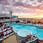 Pool deck of a cruise ship at sunset